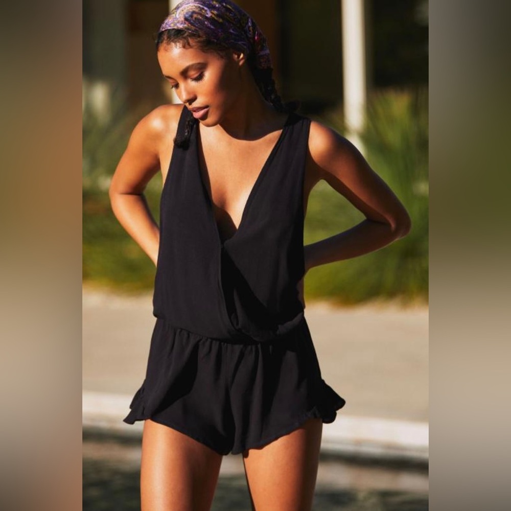 PQ Swim Black Sleeveless Ruffle Anne Marie Romper size M/L NWT